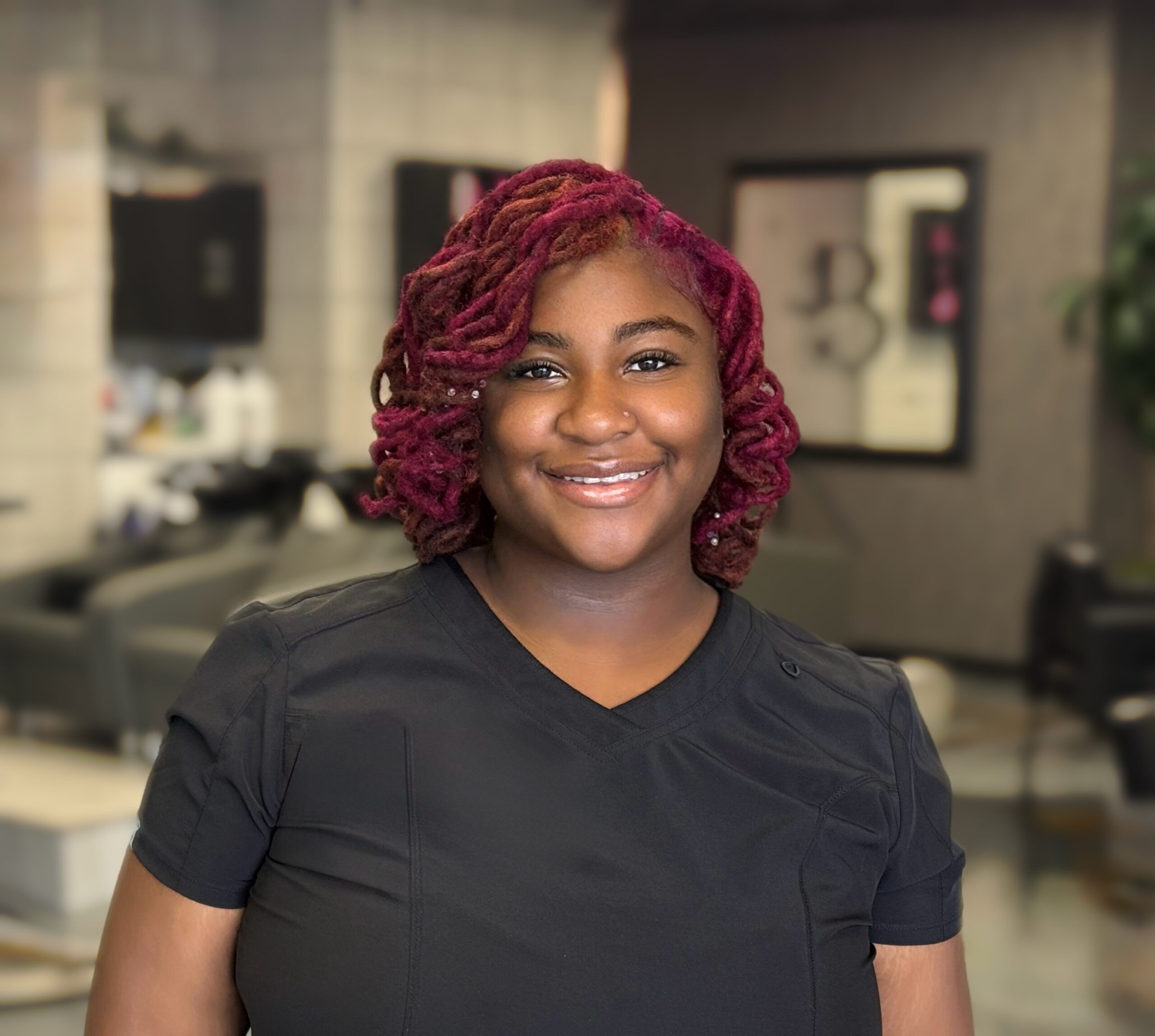 La'angel Lowman Master Cosmetologist La'angel is a licensed cosmetologist with over five years of experience in the beauty and wellness industry. With a special interest in scalp health, hair wellness, and holistic self-care, she creates relaxing, personalised experiences tailored to each client's needs. Her thoughtful approach makes every appointment a chance to unwind, leaving clients feeling confident, refreshed, and cared for.